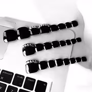 Enhance Your Beauty with These 24pcs Short Square Fake Nails in Elegant And Cool Glossy Black, Featuring Shiny Rhinestones. These Stylish And Versatile Nails Are Perfect for Dates And Parties in Spring And Summer - Image 2