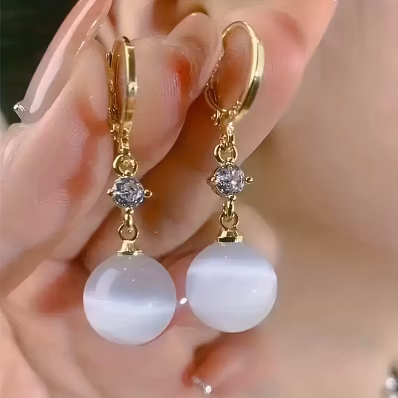 A Stylish Vintage Earring Set with Golden Toned Ring Earrings and Sparkling Details for Casual Attire, Celebrations and Holiday Occasions. Great Gift Choice for Women.